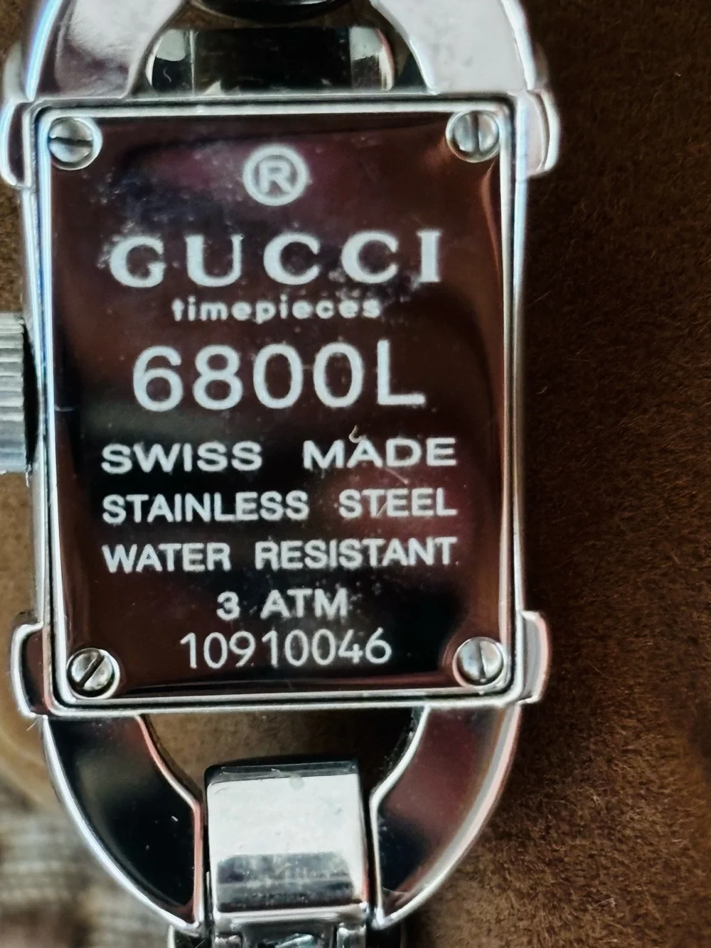 Gucci Silver Rectangular Dial Women's Watch with Bamboo band.